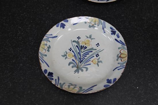 Seven English and Dutch delftware plates and dishes, c.1700-1760, 22 - 23cm, some damage